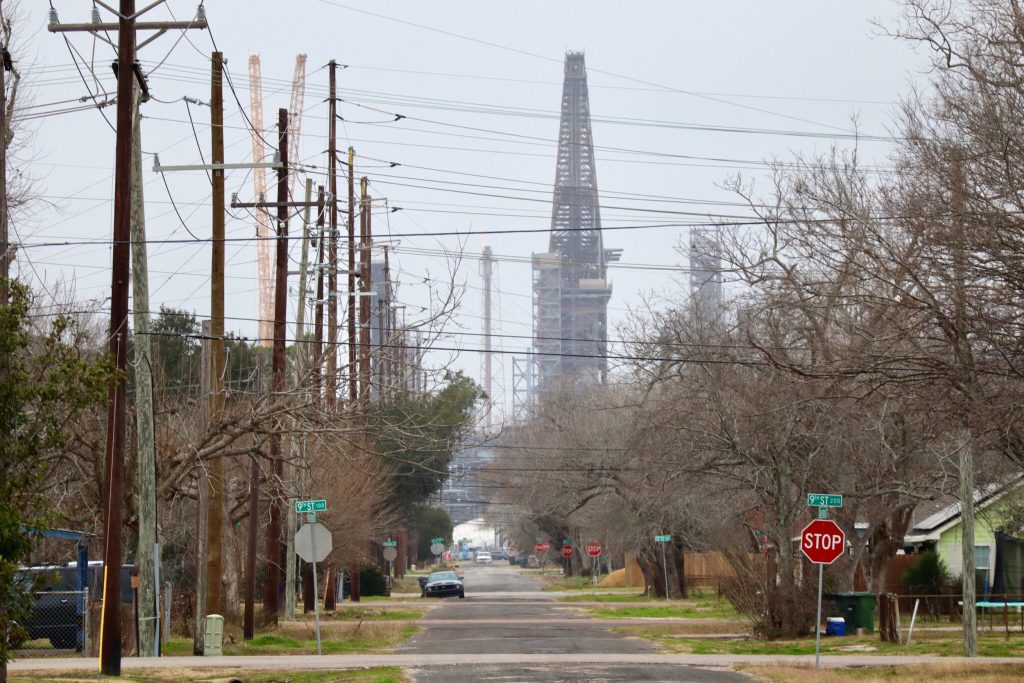 The Motiva oil refinery, the largest in the United States, looms over a residential neighborhood in Port Arthur, Texas.